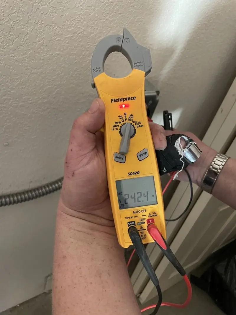 Voltage testing with clamp meter during Circuit Breaker Repair in Alexander City